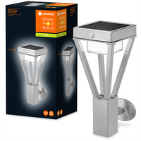 LED 6W 550lm 3000K IP44 Strieborná vonkajšia záhradná nástenná lampa so senzorom pohybu a súmraku Endura Ledvance